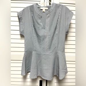 NWOT Peplum top. Never worn. Fits like size M